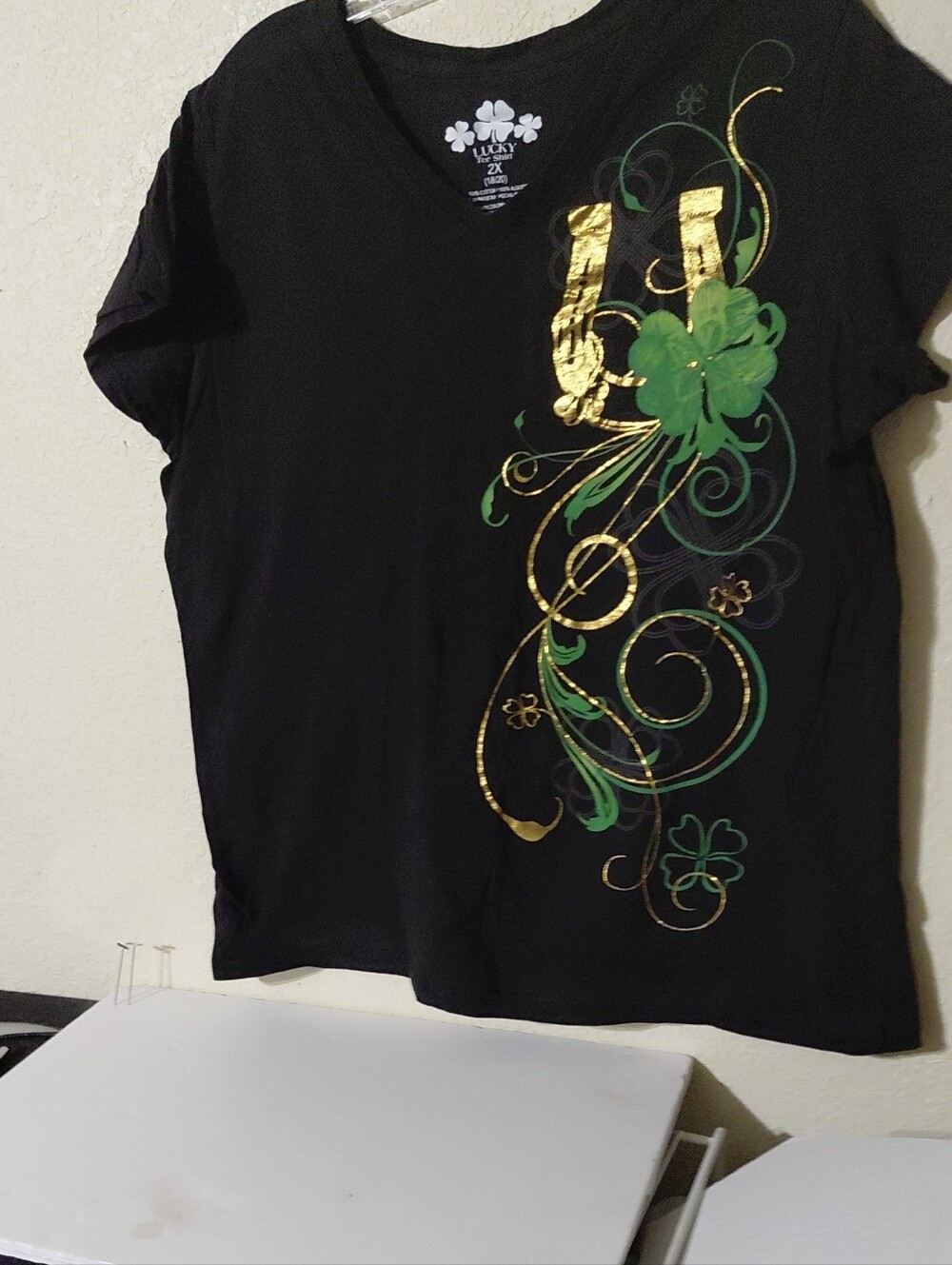 Lucky Brand Black V-Neck Shirt with Gold & Green Shamrock Design
